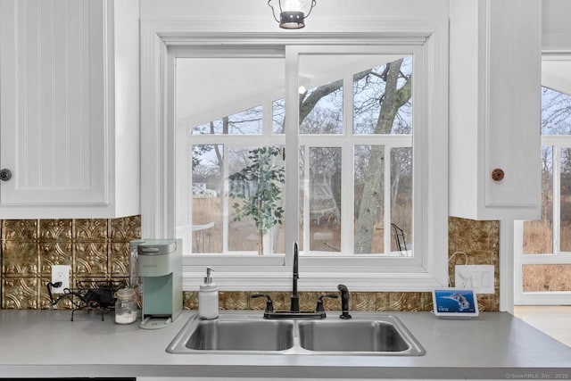 37 Woodland Dr, Old Saybrook, CT 06475 - kitchen with a sink, white cabinets, tasteful backsplash, and healthy amount of natural light