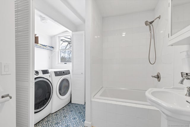 37 Woodland Dr, Old Saybrook, CT 06475 - bathroom featuring washing machine and dryer, a sink, and tiled shower / bath combo