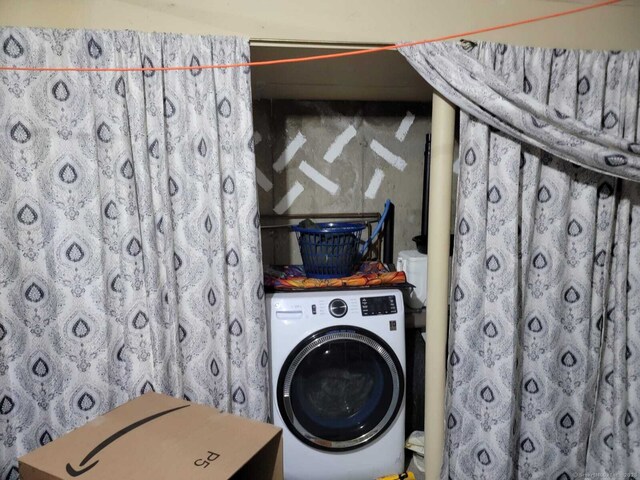 24 Deerwood Ln Unit 3, Waterbury, CT 06704 - clothes washing area with washer / dryer