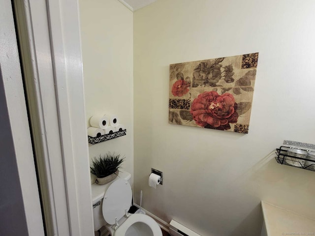 24 Deerwood Ln Unit 3, Waterbury, CT 06704 - bathroom featuring toilet and a baseboard heating unit