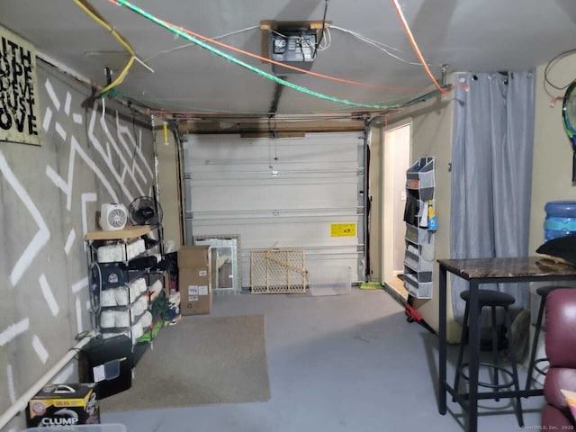 24 Deerwood Ln Unit 3, Waterbury, CT 06704 - garage featuring a garage door opener