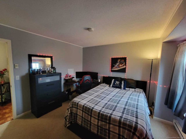 24 Deerwood Ln Unit 3, Waterbury, CT 06704 - bedroom featuring baseboards, a textured ceiling, a baseboard heating unit, and carpet