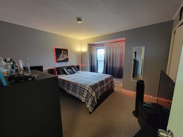 24 Deerwood Ln Unit 3, Waterbury, CT 06704 - carpeted bedroom featuring a textured ceiling and a baseboard radiator
