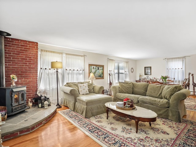 48 Meyer Pl, Greenwich, CT 06878 - living area with wood finished floors and a wood stove
