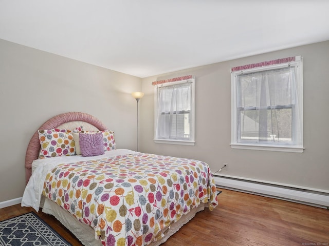 48 Meyer Pl, Greenwich, CT 06878 - bedroom featuring wood finished floors and baseboard heating