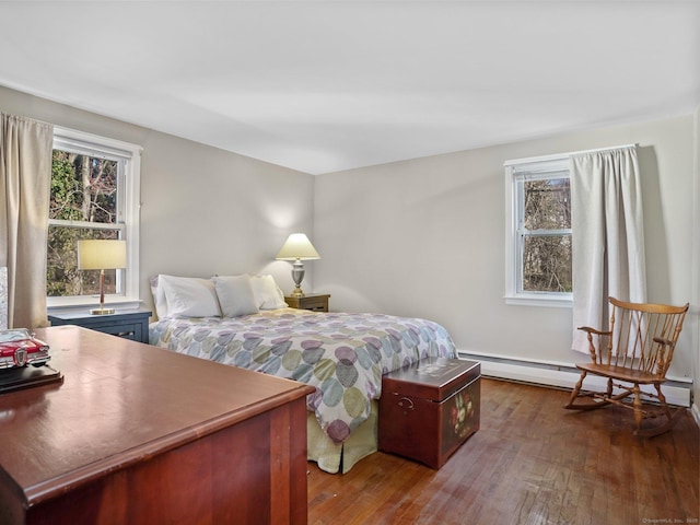 48 Meyer Pl, Greenwich, CT 06878 - bedroom featuring dark wood finished floors, multiple windows, and a baseboard radiator