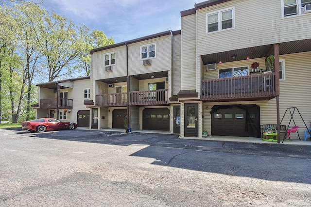 23 Hart Pl Apt 3, Plainville, CT 06062 - view of property featuring a garage
