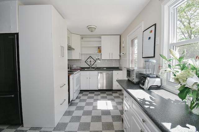 23 Hart Pl Apt 3, Plainville, CT 06062 - kitchen with dishwasher, plenty of natural light, dark countertops, and freestanding refrigerator