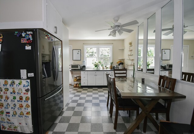 23 Hart Pl Apt 3, Plainville, CT 06062 - kitchen featuring fridge with ice dispenser, ceiling fan, dark floors, and white cabinets