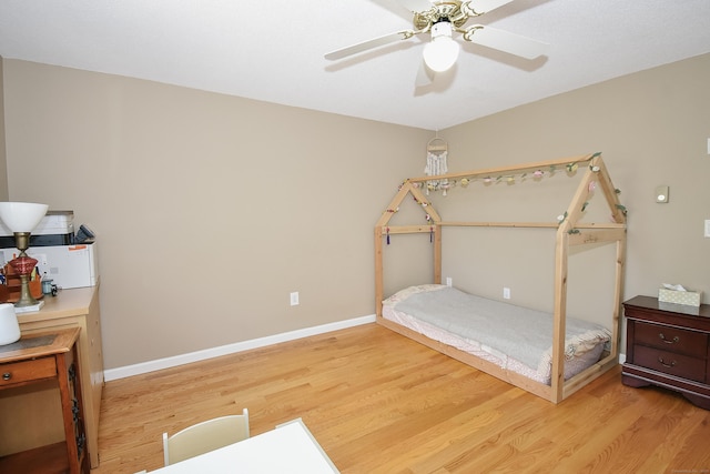 23 Hart Pl Apt 3, Plainville, CT 06062 - unfurnished bedroom with wood finished floors, baseboards, and a ceiling fan