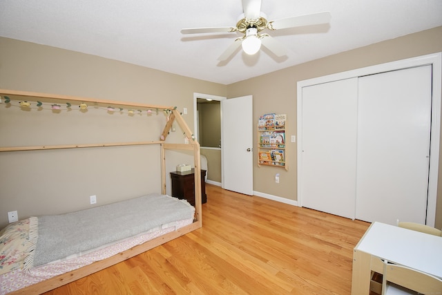 23 Hart Pl Apt 3, Plainville, CT 06062 - bedroom with wood finished floors, a closet, ceiling fan, and baseboards