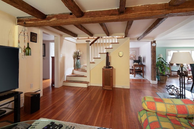 2 Perry St, Salisbury, CT 06039 - living area featuring wood finished floors, beam ceiling, stairs, and baseboards