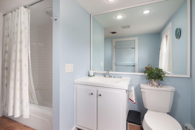 2 Perry St, Salisbury, CT 06039 - bathroom with toilet, vanity, a baseboard radiator, shower / tub combo with curtain, and recessed lighting