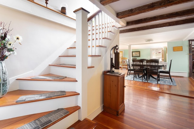 2 Perry St, Salisbury, CT 06039 - staircase featuring wood finished floors, beam ceiling, and baseboards