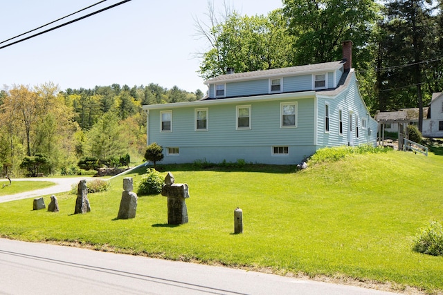 2 Perry St, Salisbury, CT 06039 - view of side of home featuring a chimney and a yard