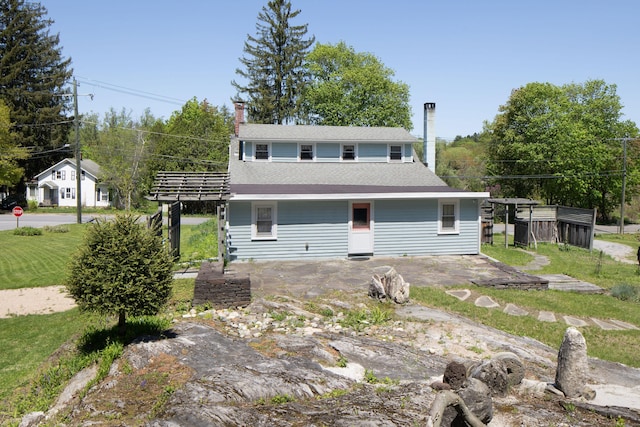 2 Perry St, Salisbury, CT 06039 - back of property with a chimney