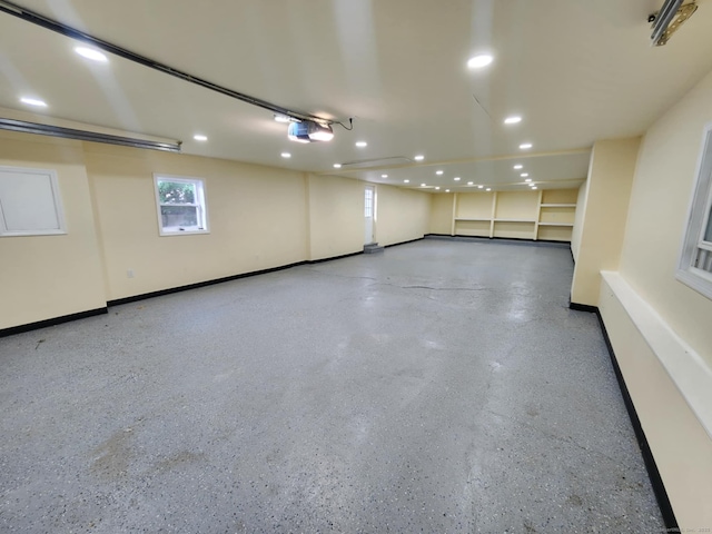 20 Rosina Rd, Hamden, CT 06514 - garage featuring recessed lighting and a garage door opener