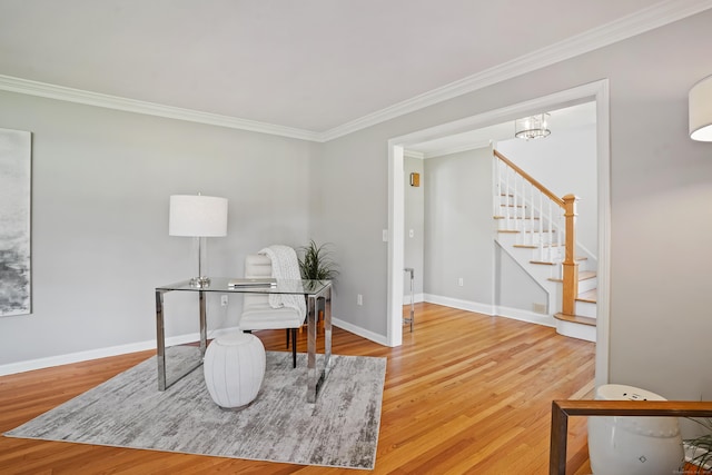 office with crown molding, wood finished floors, and baseboards