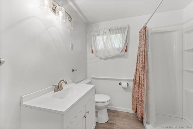287 Prospect St, Wethersfield, CT 06109 - bathroom with toilet, a shower with shower curtain, wood finished floors, vanity, and baseboards