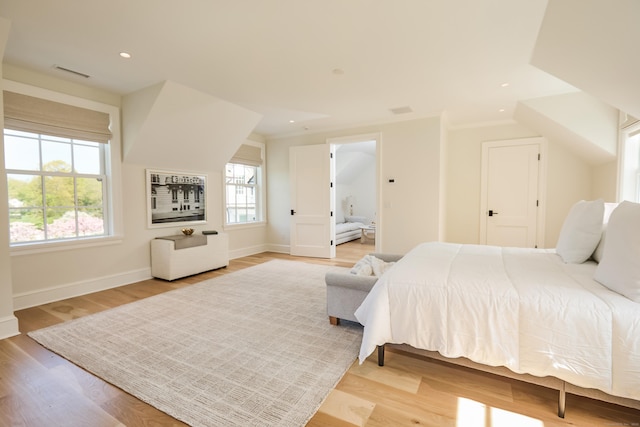 bedroom featuring baseboards, recessed lighting, light wood-style floors, and visible vents