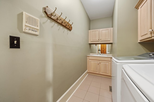 14 Turnberry Rd, Wallingford, CT 06492 - laundry room featuring independent washer and dryer, cabinet space, light tile patterned flooring, and baseboards