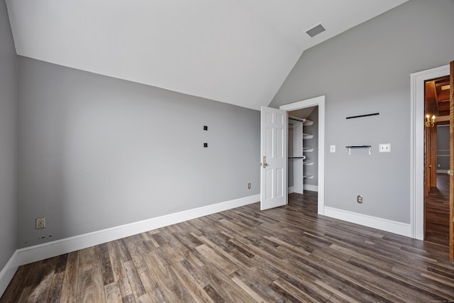 14 Turnberry Rd, Wallingford, CT 06492 - unfurnished bedroom with vaulted ceiling, dark wood-type flooring, baseboards, a spacious closet, and a closet