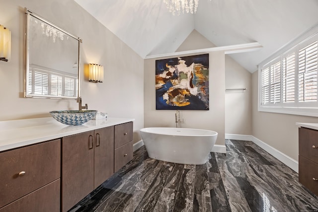 14 Turnberry Rd, Wallingford, CT 06492 - full bathroom with lofted ceiling, vanity, marble look tile flooring, a freestanding bath, and plenty of natural light