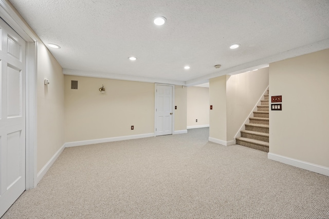 14 Turnberry Rd, Wallingford, CT 06492 - finished basement featuring recessed lighting, light carpet, stairway, baseboards, and a textured ceiling