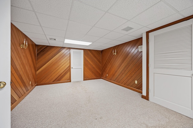 14 Turnberry Rd, Wallingford, CT 06492 - finished basement with carpet flooring, a drop ceiling, wood walls, and baseboards