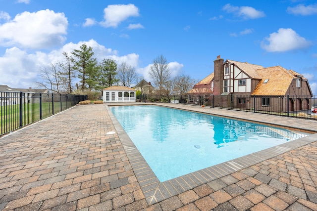 14 Turnberry Rd, Wallingford, CT 06492 - view of swimming pool featuring fence, a patio area, and an outdoor structure