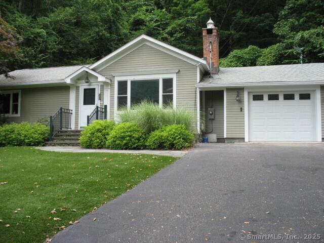 128 S Kent Rd, Kent, CT 06785 - ranch-style house with an attached garage, driveway, a chimney, and a front yard