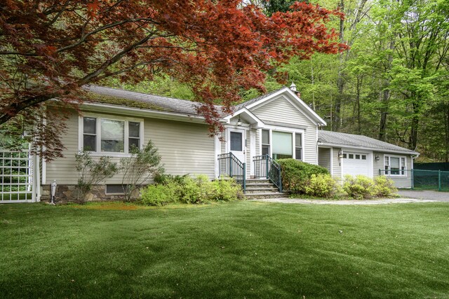 128 S Kent Rd, Kent, CT 06785 - ranch-style home featuring fence, a garage, and a front lawn