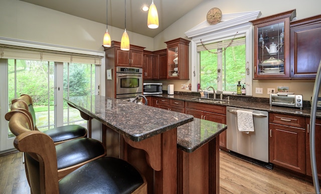 128 S Kent Rd, Kent, CT 06785 - kitchen with a healthy amount of sunlight, stainless steel appliances, light wood-type flooring, and a sink
