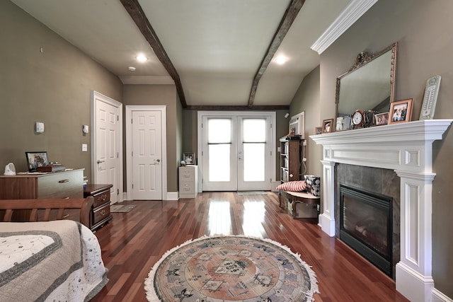128 S Kent Rd, Kent, CT 06785 - living area with french doors, baseboards, a tiled fireplace, wood finished floors, and beamed ceiling
