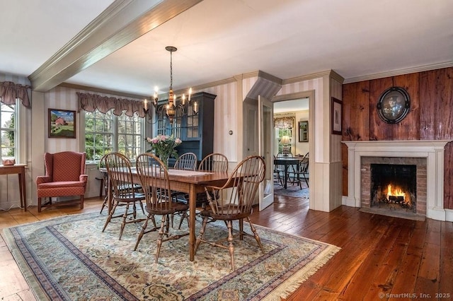 120 Boston Post Rd, Old Lyme, CT 06371 - dining space featuring crown molding, a chandelier, hardwood / wood-style floors, a fireplace, and beamed ceiling