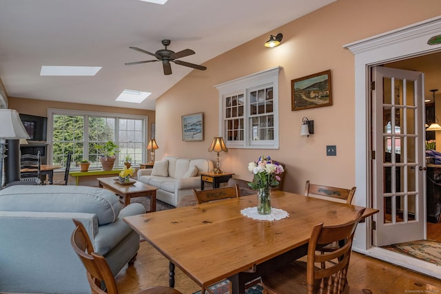 120 Boston Post Rd, Old Lyme, CT 06371 - dining room with a skylight, a ceiling fan, and vaulted ceiling
