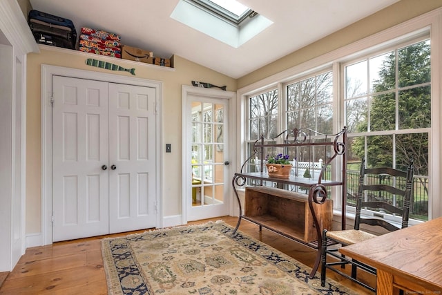 120 Boston Post Rd, Old Lyme, CT 06371 - home office with a skylight, wood finished floors, and vaulted ceiling