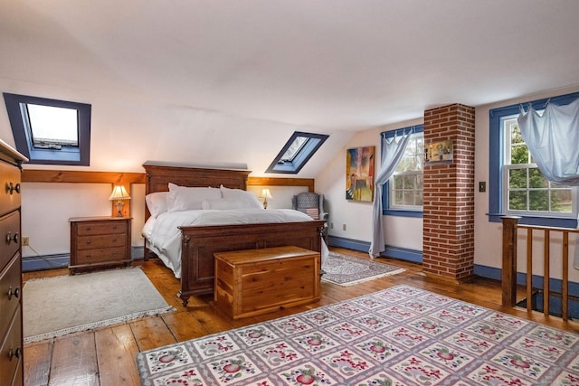 120 Boston Post Rd, Old Lyme, CT 06371 - bedroom featuring a skylight, a baseboard radiator, and hardwood / wood-style flooring