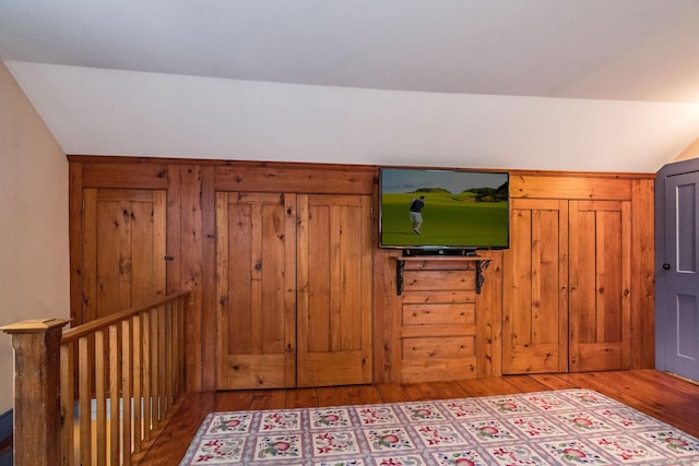 120 Boston Post Rd, Old Lyme, CT 06371 - bedroom featuring wood finished floors and vaulted ceiling