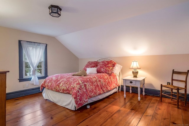 120 Boston Post Rd, Old Lyme, CT 06371 - bedroom with a baseboard radiator, vaulted ceiling, and hardwood / wood-style flooring
