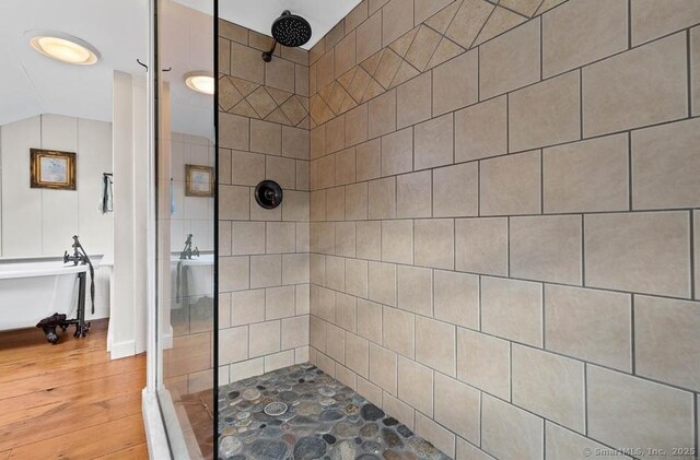 120 Boston Post Rd, Old Lyme, CT 06371 - full bathroom featuring tiled shower and wood finished floors