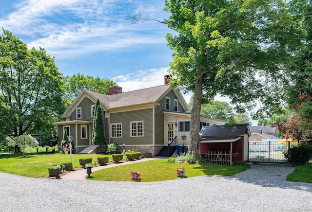 120 Boston Post Rd, Old Lyme, CT 06371 - view of front of property with a storage shed and a chimney