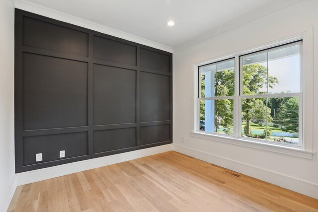 empty room with visible vents, baseboards, recessed lighting, and light wood-style floors
