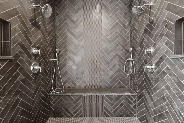 bathroom with tiled shower