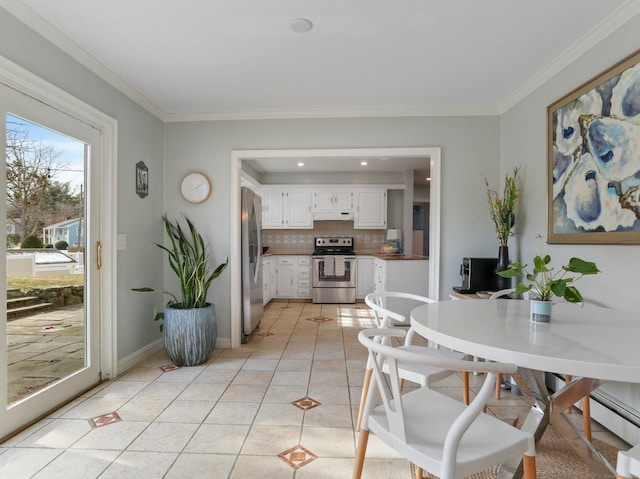 dining room with crown molding, baseboards, and light tile patterned floors