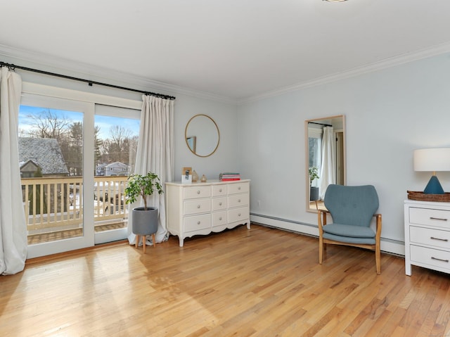 living area featuring ornamental molding, light wood finished floors, and a baseboard radiator