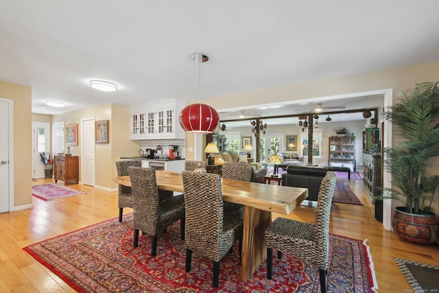 34 Kent Rd, Warren, CT 06754 - dining room with healthy amount of natural light, light wood-type flooring, and baseboards