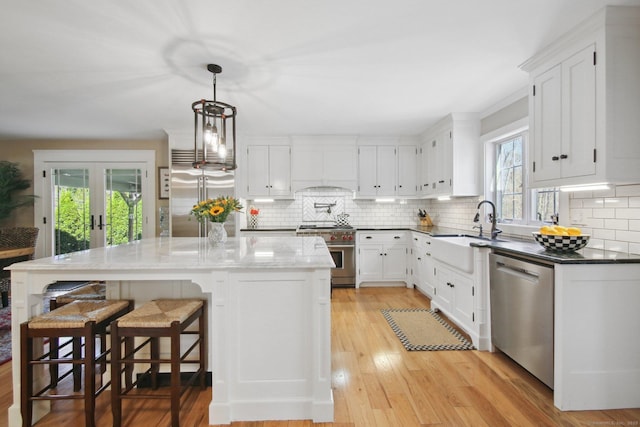 34 Kent Rd, Warren, CT 06754 - kitchen with high quality appliances, healthy amount of natural light, and backsplash