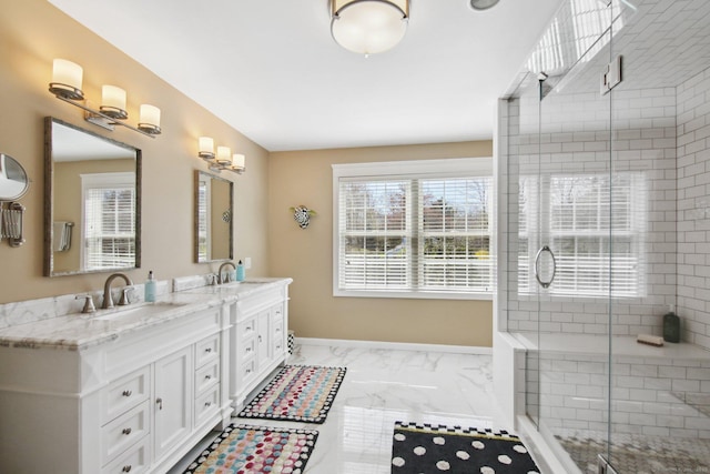 34 Kent Rd, Warren, CT 06754 - full bathroom featuring marble finish flooring, a shower stall, double vanity, and baseboards