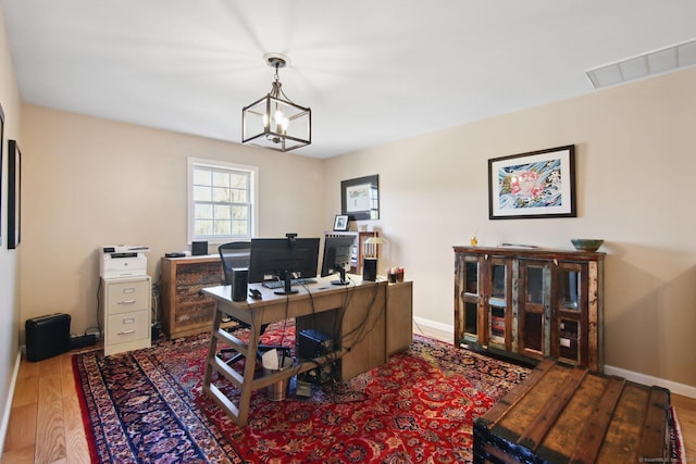 34 Kent Rd, Warren, CT 06754 - home office featuring wood finished floors, baseboards, and a chandelier